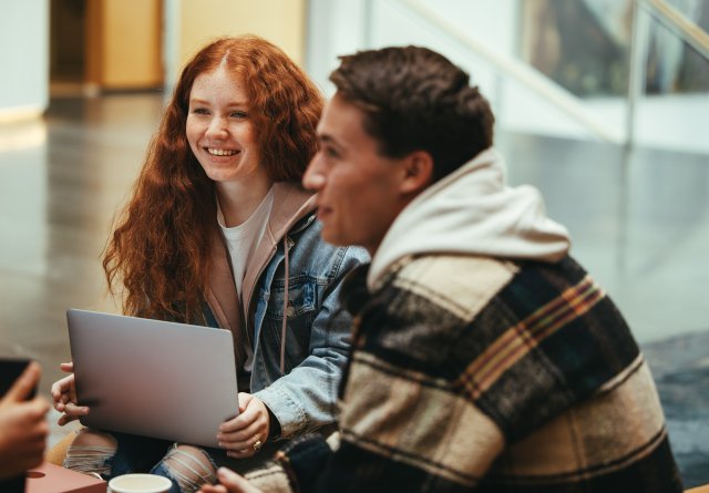 Students studying together in college campus