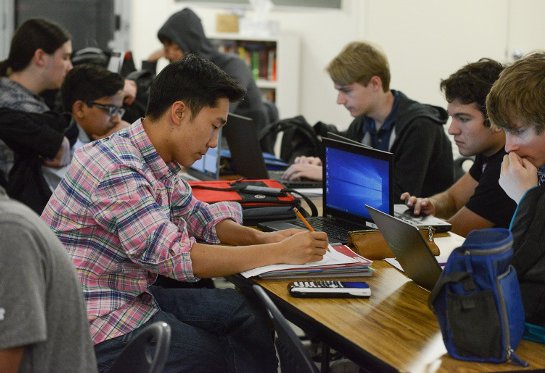 Students working hard in class