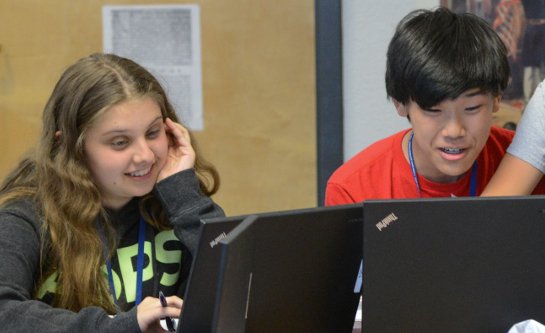 Students working together in computer lab