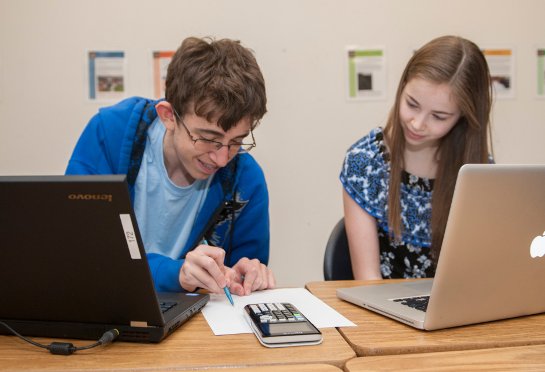 Students working together in class