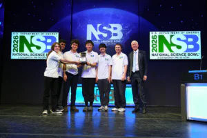 Team posing with trophy
