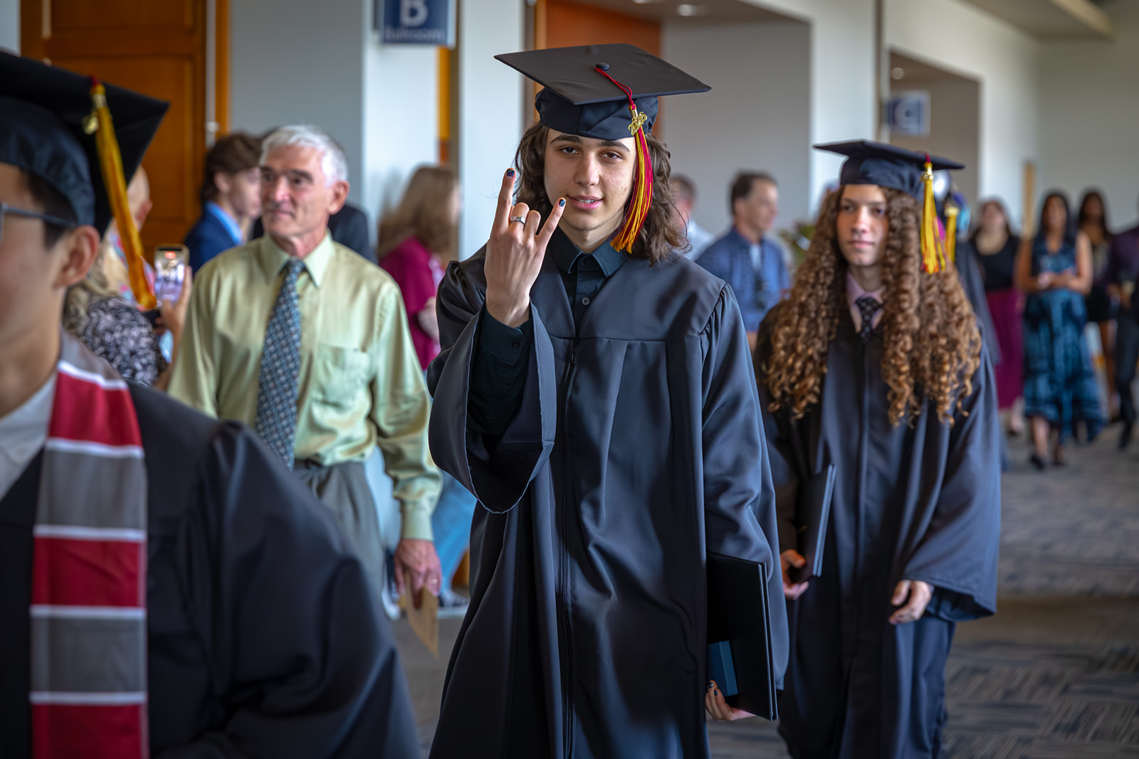 Graduate posing for a photo